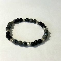 Nwot Men’s Beaded Stretch Bracelet In Black, Silver And Gray. A Great Gift Or Purchase For Any Guy That Loves Bracelets. If Any Of Our Bracelets Are Purchased In Bundles Of 2 Or More A Discount Will Be Given Adjustable Black Stretch Bracelet With Silver Beads, Adjustable Black Bracelet With Silver Beads, Casual Silver Stretch Bracelet With Black Beads, Casual Black Jewelry With Spacer Beads, Black Spiritual Bracelets With Silver Beads, Spiritual Black Bracelets With Silver Beads, Guys Bracelets, Men Bracelet, Mens Beaded Bracelets