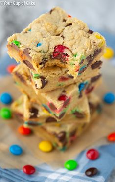 a stack of cookies and candy bars on top of each other