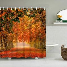 a shower curtain with an autumn scene in the background