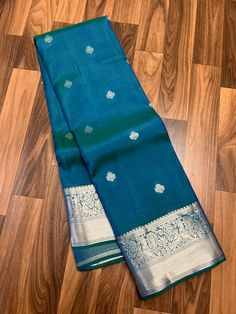 Bridal Collection Teal Blue Color Pure Kanchipuram Silk Saree | Indian Traditional Ethnic Saree | Wedding or Party Wear Saree | Handwoven Gift Saree for Her Product Details : Saree Type : Pure Kanchipuram Silk Saree Silver Zari, Silk Mark Certified Blouse Piece : Yes (Un-Stitched) Saree Length : 5.5 Meters Blouse Piece Length : 80 cm Saree Weight : 0.9 kg Saree Fabric : Pure Kanchipuram Silk  Color : As shown in the picture Work : weaving Pattern : designer Occasion: Party Wear, Formal Wear, Fes Blue Handloom Lehenga For Traditional Ceremonies, Blue Handloom Traditional Wear For Ceremonies, Blue Handloom Lehenga For Diwali, Handloom Blue Lehenga For Diwali, Wedding Blouse Piece In Tissue Silk With Traditional Patterns, Wedding Tissue Silk Blouse With Traditional Patterns, Blue Elegant Traditional Wear For Puja, Wedding Handloom Tissue Silk Lehenga, Blue Traditional Pattern Blouse Piece For Weddings