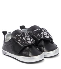 Add some sparkle to your little one's wardrobe with these Moschino Kids leather sneakers. Featuring black and silver tones, they feature the brand's iconic Teddy Bear motif with rhinestones. | MOSCHINO BAMBINO Baby embellished leather sneakers Leather Low-top Sneakers With Rhinestones, Leather Sneakers With Rhinestones And Round Toe, Embellished Leather Sneakers For Streetwear, Embellished Leather Sneakers With Round Toe, Sporty Embellished Sneakers, Black Sneakers With Rhinestones And Round Toe, Black Rhinestone Sneakers With Round Toe, Embellished Leather Sneakers, Silver Embellished Low-top Sneakers