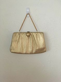 Welcome to South of the River Antiques Up for Sale: One Vintage 1960s Gold Lame Convertible Evening Bag. Overall purse is in very good condition, minor wear and very clean. Interior has one small hole, a few tag holes, and mark across one corner. Exterior has no stains or holes, metal has minor wear. Measures approx 9.5'' by 5.5'' by 1''. Please ask if you have any questions, comes from a smoke free home. THANKS FOR LOOKING, please email us if you have any questions or would like to request addi Gold Lame, Gold Bag, Evening Handbag, Bag Vintage, Handbag Purse, Vintage 60s, Vintage 1960s, Chain Strap, Vintage Gold