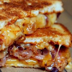 a grilled cheese and bacon sandwich on a wooden table