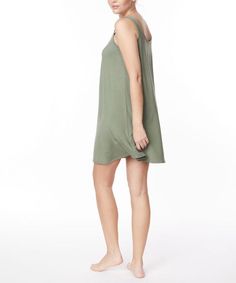 BAMBOO CAMI NIGHTGOWN DRESSTHIS CAN BE CASUAL DRESS AS WELL.SUPER SOFT AND LIGHT WEIGHT.CENTER PLEAT ACCENT AND ALLAROUND INBINDING FINISHEDEAAY AND FLEXIBLE FITMade In: MADE IN USAFabric Contents: Bamboo Spandex Summer Loungewear Dresses With Scoop Neck, Green Summer Sleepwear For Night, Casual Summer Sleepwear Mini Length, Casual Slip Dress With Spaghetti Straps For Loungewear, Relaxed Fit Dress For Lounging, Casual Summer Mini Dress For Sleep, Casual Summer Nightgown, Casual Spaghetti Strap Dress For Night, Casual Mini Length Sleepwear