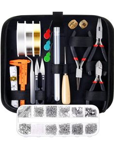 a black case filled with lots of crafting supplies