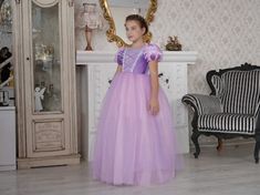 Make your little princess's fairy tale dreams come true with our enchanting Rapunzel costume dress! Perfectly designed for girls, this magical gown features vibrant colors, exquisite lace and ribbon details, and soft, comfortable cotton fabric for all-day play. Ideal for birthdays, dress-up, weddings, photoshoots or any special occasion, let her imagination soar as she steps into the world of enchantment. Let your little one shine and twirl in her very own Rapunzel adventure! ♥ If you want a cus Fairytale Tulle Princess Dress For Dress-up, Princess Style Ball Gown For Pageant, Fairytale Princess Dress For Pageants, Fairytale Tulle Fairy Dress For Pageant, Purple Princess Fairy Dress For Costume Party, Princess Style Fairy Dress For Costume Party, Fairytale Princess Dress Ball Gown For Dress-up, Fairytale Princess Ball Gown Dress, Fairytale Tulle Fairy Dress For Pageants