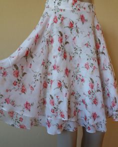 "Vintage 90s white with floral print short skirt. Skirt is in two layers,spreads the full circle. Has red,green,brown with beige like shadow color. Has high waist. Closure is with zipper and button on the side. In excellent vintage condition, Tag size DE 36,fits to size US XS/S,check the measures. Materials: viscose 100% Measures taken flat one side: waist 36 cm = 14,17\" hips approximately 72 cm = 28,35\" length measured from waist 51 cm = 20,08\" We will take returns only if there is a problem Short Floral Skirt, Layers Skirt, Shadow Color, 90s Shorts, Skirt High Waist, Skirt Skirt, Skirt White, Layered Skirt, Floral Print Shorts