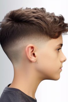 A timeless and neat haircut choice for boys. The low taper fade creates a transition into a short top resulting in a clean and defined line. Click here to check out more trendiest boys haircuts for school. Boys Cuts 2024, Low Tapered Fade Boys, Boys Haircut Trends 2024, Baseball Hair Cuts Boys, Tapered Fade Boys, Boys Faded Cut, Low Taper Fade Boys Haircut, Low Fade Haircut Boys, Boys Haircut Thick Straight Hair