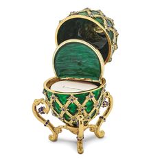 Bejeweled Pewter Green, Gold Tone Color Enamel Finish with Crystal Stones ROYAL COACH with Ring Holder and Coach Inside Egg also comes with 18-inch necklace pendant and gift boxed Formal Green Enamel Jewelry, Luxury Green Enamel Jewelry, Luxury Green Collectible Jewelry, Formal Jeweled Enamel Jewelry, Green Luxury Metal Jewelry, Green Rhinestone Jewelry For Gift, Green Enamel Wedding Jewelry, Green Enamel Jewelry With Gemstones, Green Enamel Jewelry For Wedding