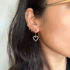 "Dainty Crystal CZ Huggie Hoop Earrings ❀❀ EARRING INFO: ❀❀ ➳ Huggie hoop is stainless steel ➳ Heart charm setting is gold plated brass ➳ Hoop size: 13.5mm ➳ Earring pin: 1mm ➳ Heart charm size: 15mm ❀❀ VIEW MORE EARRINGS: ❀❀ https://www.etsy.com/shop/bitsnpiecess/?section_id=23539584 ❀❀ RETURN POLICY: ❀❀ Please note that because of health/hygienic reasons, earrings cannot be returned or exchanged ❀❀ SHIPPING & PROCESSING: ❀❀ All products are MADE TO ORDER Please see \"Shipping and returns policy\" on this page for the latest processing times and estimated delivery dates. Estimated shipping is also shown in your shopping cart. Thank you!♡ ❀ Made in Southern California ❀" Gold Hypoallergenic Open Heart Hoop Earrings, Everyday Gold Plated Huggie Heart Earrings, Everyday Huggie Hoop Earrings For Valentine's Day, Trendy Hypoallergenic Hoop Earrings For Valentine's Day, Gold Plated Hoop Earrings For Everyday And Valentine's Day, Valentine's Day Huggie Hoop Earrings, Valentine's Day Tarnish Resistant Hoop Earrings, Trendy Open Heart Hoop Earrings For Pierced Ears, Trendy Huggie Hoop Earrings With Heart Charm