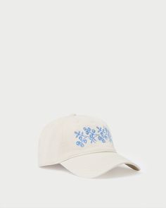 Cairo Natural/Blue Embroidered Cap White Embroidered Baseball Cap With Curved Bill, White Embroidered Dad Cap, Cream Curved Brim Baseball Cap With Embroidered Logo, Cotton Baseball Cap With Embroidered Curved Visor, Cream Baseball Cap With Embroidered Logo, Cream Embroidered Cap, Embroidered Cream Cap, White Embroidered Casual Dad Hat, White Embroidered Visor Baseball Cap