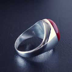 925 STERLING SILVER MENS RING WITH NATURAL RED CORAL METAL : .925 Sterling Silver GEMSTONE: Red Coral (origin: Red Sea - Egypt) DIMENSIONS OF THE STONE (mm/in): 13x18 mm RING SIZE: US 10 *for other sizes please send a message after completing the order. Red Untreated Rings As A Gift, Untreated Red Rings For Gift, Untreated Red Rings As A Gift, Modern Hallmarked Red Rings, Handmade Red Sterling Silver Signet Ring, Red Sterling Silver Signet Ring For Gift, Red Sterling Silver Oval Signet Ring, Red Oval Sterling Silver Signet Ring, Silver Mens Ring