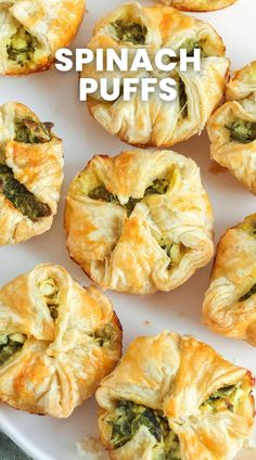 spinach puffs on a white platter with the words spinach puffs above them