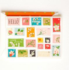 a card with flowers on it and the words hello friend written in different languages below