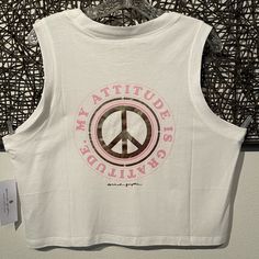 Spiritual Gangster Crop Top Nwt Size Xl Lightweight & Soft Material. Wear Oversized With Sports Bra. Casual Graphic Print Tank Top With Relaxed Fit, Casual Relaxed Fit Graphic Print Tank Top, Fall Casual Graphic Print Tank Top, White Sleeveless Top For Leisure, Leisure Tops With Letter Print, White Cotton Tank Top For Fall, White Casual Crop Top With Graphic Print, Trendy White Leisure Tops, White Trendy Tops For Leisure