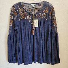 Brand New With Tags. Perfect Condition. "Dramatic Folklore Embroidery Blooms On Cotton Mesh Along The Yoke Of Our Easy Top With Lovely Blouson Sleeves And Elastic Cuffs." -Mesh And Embroidered Accents -Fun Tassel Detail -Long Sleeves With Elastic Cuffs -Relaxed Fit -53% Linen And 47% Lyocel -Mesh Detailing Is Made Of 65% Cotton And 35% Nylon Size Xs Chest: 19.5 Inches Length: 26 Inches Sleeve: 24 Inches Festive Blue Long Sleeve Embroidered Top, Peasant Long Sleeve Tops With Embroidered Border, Multicolor Embroidered Long Sleeve Peasant Top, Blue Folk Style Embroidered Long Sleeve Top, Folklore Embroidery, Blue Peasant Embroidered Long Sleeve Top, Long Sleeve Shirt, Blue Orange, Sleeve Shirt