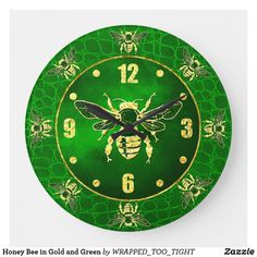 a green clock with yellow bees on it