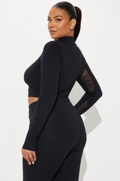 Available In Black, Chocolate, And Mauve. Active Top Mock Neck Long Sleeve Super Soft Mesh Cut Out Detail Quarter Zip Thumbhole Medium Impact Stretch Pair With "Cara Super Soft Active Stirrup Legging" Body 1: 77% Polyester 23% Spandex Body 2: 82% Nylon 18% Spandex Imported | Jolie Super Soft Active Top in Black size 1X by Fashion Nova Black Stretch Crop Top With Mesh Sleeves, Stretch High Neck Top With Mesh Sleeves, High Neck Tops With Mesh Sleeves And Stretch Fit, Black Gym Tops For Fall, Fitted Black Crop Top With Mesh Sleeves, Black Tops For Gym In Fall, Black Workout Tops For Fall, Black Mesh Back Crop Top For Workout, Fitted Sports Tops With Mesh Sleeves