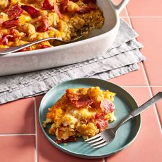 a casserole dish on a plate with a fork