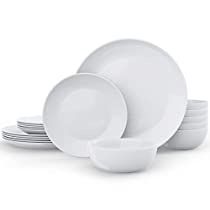 white dishes stacked on top of each other