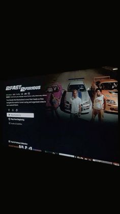 an image of the fast and the furious movie website on a computer screen with two men standing in front of cars