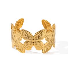 Transform Your Look with Elegance and Style Elevate your ensemble with our stunning Stainless Steel Butterfly Big Open Bracelet. Crafted with precision and designed to dazzle, this bracelet exudes elegance and sophistication. Features: High-quality stainless steel construction for durability 18K gold PVD plating for a luxurious finish Trendy butterfly design adds a touch of whimsy Waterproof for everyday wear Easy-to-wear cuff style Perfect for casual or sporty occasions Benefits: Elevates any o Butterfly Items, Gold Flower Bracelet, Chunky Cuff Bracelet, Chunky Gold Bracelet, Bracelet Stands, Butterfly Cuff, Bracelet Easy, Holiday Bracelets, Dragonfly Bracelet