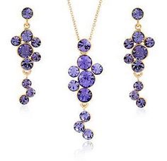 ' Featuring eye-catching purple round Austrian crystals. This cascading design of necklace earring set offers the right amount of sophistication.     Chain length 18" +2" extender ; pendant 1.65" drop  Earrings 1.5" drop  18K Italian Rosegold Plated  Lead/Nickel Free  Comes in a gift box.       ' Luxury Purple Necklace For Gift, Luxury Purple Jeweled Necklace, Luxury Purple Jewelry With Diamond Accents, Luxury Purple Necklaces For Gifts, Luxury Purple Necklaces For Gift, Luxury Purple Cluster Jewelry, Luxury Purple Cubic Zirconia Necklace, Luxury Purple Elegant Crystal Necklaces, Luxury Purple Gemstone Crystal Necklace