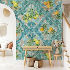 the wallpaper in this room has lemons and leaves on it