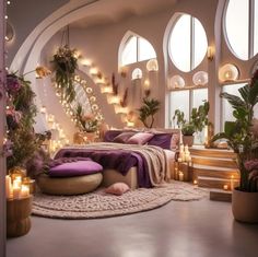 a bedroom with lots of plants and candles on the walls, along with a round bed