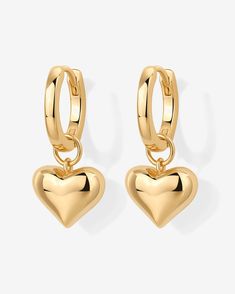 Description:Make a bold fashion statement with our stunning heart huggie earrings, perfect for adding a touch of romance to your everyday look. Small but mighty, featuring a charming heart charm, they're ideal for any occasion, from a Valentine's Day date to a cozy evening.Materials: 14K Yellow Gold or Rhodium plated. Sterling silver posts. Heart charm dimensions: 8.4mm x 10mm. Hoop diameter: 12mm Hypoallergenic, nickel free, and lead-free. Valentines Day Date, Small But Mighty, Cozy Evening, Huggie Earrings, Huggies Earrings, Bold Fashion, Charm Earrings, Heart Charm, Everyday Look