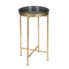 a black and gold metal side table with a round tray on it's legs