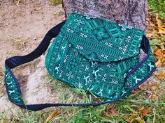 🌺 Women's Shoulder Bag, Crossbody Purse  Balochi Embroidery Green Bag - Traditional Craft, Modern Style, Unique Fashion Accessory.🌺 Embrace the charm of tradition with our exquisite Handmade Balochi Embroidery Bag. This versatile bag, adorned with intricate Balochi embroidery, is a true work of art. 🌟 Features: *🌿 Versatile Design: Use it as a crossbody bag or effortlessly switch to a chic shoulder bag. *🎨 Color Options: Available in vibrant green and passionate red, adding a pop of color to any outfit. 🛍️ Why You'll Love It: Indulge in the beauty of Balochi craftsmanship. This bag is more than an accessory; it's a cultural statement. The meticulous embroidery reflects the rich heritage of Balochistan, adding character to your style. 🌈 Product Details: *Material: High-quality fabric Green Shoulder Pouch As Gift, Green Pouch Shoulder Bag With Cell Phone Pocket, Embroidered Satchel Shoulder Bag For School, Green Backpack Style Shoulder Bag Gift, Embroidered Green Shoulder Bag As Gift, Green Shoulder Bag Pouch For Gift, Green Pouch Flap Bag For Everyday Use, Green Backpack Shoulder Bag Gift, Embroidered Green Shoulder Bag For Gift