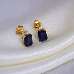 Minimalist Earrings, Blue Sapphire Stud, 14K Gold Earrings, Push Back Studs, Vintage Stud, Women's Earrings, Tiny Cartilage Dainty Earrings. Blue Sapphire push back studs earrings is a specials gift for your specials one these 925 sterling silver base metal diamond earrings is a looking classic design for all types of skin tone or all types of outfits . we can customize these as per your requirement all types of customization are also available . These minimalist studs is daily wear , party wear Blue Diamond Earrings For Gift, Gift Blue Diamond Earrings, Blue Dangle Diamond Earrings For Gifts, Blue Diamond Dangle Earrings For Gifts, Blue Diamond Dangle Earrings As Gift, Blue Tarnish-resistant Earrings For Gift, Blue Diamond Drop Earrings For Gift, Classic Sapphire Earrings For Gift, Sapphire Single Earring As Gift