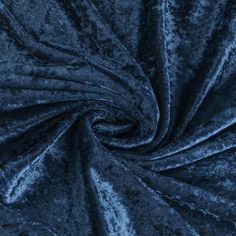 an up close shot of a blue velvet fabric