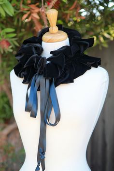 "Midnight Black meets Velvet for drinks after work, in a deliciously ruffled scarf ... and ties a silky satin bow around an enchanted evening!! ... Add a touch of sophisticated glamour to any ensemble, and take this luscious velvet collar out on the town!! Perfect for an afternoon at the orchestra, opera night, or a midnight movie!! ... Makes a lovely neck ruff for an Elizabethan costume too. Double drawstring ties make it easy for you to create your own look with it on a whim. Wear it 5 differe Velvet Collar, Elegant Formal Neckwear For Fall, Elegant Fitted Neckwear For Party, Diy Clown Ruffle Collar, Diy Clown Collar Ruffles, Jester Neck Ruffle, Victorian Ruffle Collar, Neck Ruffle Collar, Elizabethan Costume