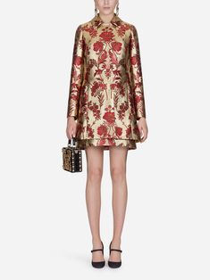 This classic Dolce & Gabbana Metallic Floral-Jacquard Coat features a sophisticated blend of silk, cotton and acetate for luxurious look feel. With its round neckline, button-up front, jacquard design, long sleeves, branded buckle hardware, red gold embroidered pattern, timeless is perfect any special occasion. Jacquard Coat, Bad Dresses, Lurex Dress, Jacquard Shirt, Satin Long Sleeve, Exclusive Clothing, Party Look, Luxury Clothing, Dolce & Gabbana