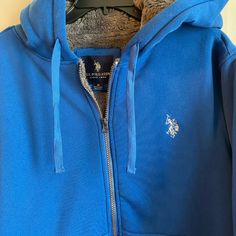 U.S. Polo Assn. Men's Cobalt Blue Grey Sherpa Lined Full Zip Hoodie Medium 38-40 Nwt This Hoodie Features Feel Dry, Which Is Engineered To Wick Moisture Away From Your Skin To The Surface Of The Hoodie To Keep You Feeling Dry, Cool, And Comfortable In All Weather Conditions. Polo Zip Up Hoodie, Dark Grey Coat, Zippered Sweater, Grey Coat, Hoodie Coat, Winter Fits, Pocket Jacket, Warm Jacket, White Jacket