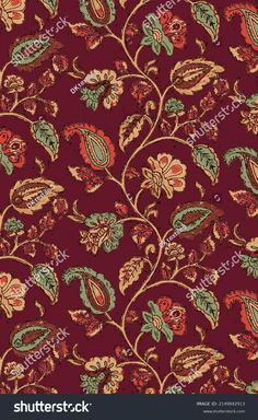 a red and green floral pattern on fabric