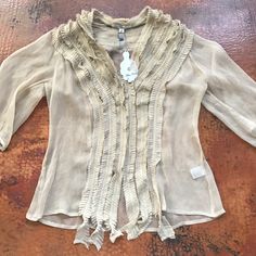 Sheer Blouse. Never Worn. Absolutely Beautiful!!!! Bohemian Fitted Blouse For Layering, Fitted Bohemian Blouse For Layering, Bohemian Short Sleeve Blouse For Layering, Elegant Fringe Tops For Fall, Chic Summer Blouse With Tassels, Elegant Fringe Tops For Spring, Elegant Fall Fringe Tops, Beige Tassel Top For Spring, Elegant Long Sleeve Tops With Tassels