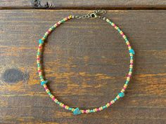 This is the Turquoise Princess Beaded Choker.  Made for the free spirited cowgirls that rule with grace and love!  This choker is beautiful and elegant, yet also great for everyday casual wear. - It is fastened with antiqued bronze coated brass pieces, and is made with durable native glass seed beads. - My beads are always purchased here in Oklahoma from local native sellers. - It is 13" long with a 2.5" extender chain making it up to 15.5" long. - As pictured, the turquoise stones will vary a l Turquoise Beaded Hippie Necklace, Festival Turquoise Necklace With Tiny Beads, Turquoise Hippie Beaded Necklace, Adjustable Beaded Turquoise Necklace, Adjustable Turquoise Beaded Chain Necklace, Bohemian Turquoise Necklace With Beaded Chain, Adjustable Beaded Turquoise Necklace For Festivals, Adjustable Turquoise Beaded Necklace With Tiny Beads, Bohemian Adjustable Turquoise Necklace With Beaded Chain