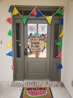 a welcome mat is placed in front of a door