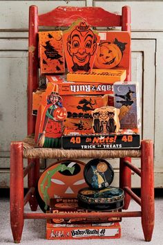 an orange chair with halloween decorations on it