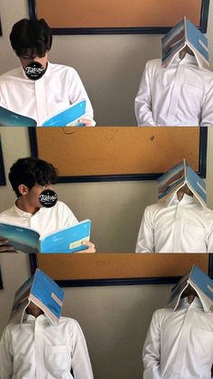 two people in white shirts are holding blue folders with their faces covered by paper