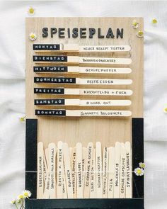 several wooden toothbrushes are arranged on a sheet of paper with the words seiseplan printed on them