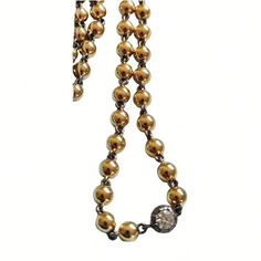 "Lower prices on our main website: https://discomarshmallow.myshopify.com Transport yourself to the opulent allure of the past with our 16-inch Ball Chain Necklace, a masterpiece that pays homage to the elegance of the Georgian and Art Deco periods. This necklace is a true embodiment of vintage charm and contemporary sophistication. At its heart, a brilliant cut 0.25 ct moissanite gleams with a brilliance that rivals the stars. The moissanite is securely nestled within a 14k blackened gold Georgian cut-down collet setting, evoking the intricacies of a bygone era. Enhancing the necklace's allure, the chain itself is a labor of artistry. Handcrafted with precision in 14k yellow gold, its links are adorned with the allure of blackened gold, adding a touch of mystique to the piece. The result Victorian Art Deco, Ball Chain Necklace, Bygone Era, Victorian Art, Art Deco Period, Ball Chain, Wedding Necklace, Vintage Charms, Labor