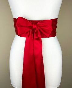 "Bright Red Sash, Red Satin Sash  Holiday Sash, Christmas Red Sash  Dress Sash Belt, Wrap Belt  Red Obi Belt, Wedding Sash Bridal  Satin Swank Make this Satin Swank® reversible waist sash the perfect finishing touch for your wedding, bridesmaid, or special occasion dress, or just the right piece to add instant polish to your dress or top.  This extra long version is 3.5 inches wide, 120 inches long, and will wrap around most waist sizes two times with a generous length remaining to tie in a bow Elegant Ribbon Sashes As Gifts, Satin Ribbon Bridal Belt For Parties, Satin Bridal Belt For Party, Elegant Red Wedding Sash, Satin Ribbon Sash For Evening, Satin Ribbon Sashes For Evening Wear, Satin Sashes With Ribbon For Gift, Evening Satin Sash With Ribbon, Evening Satin Sashes With Ribbon Detail