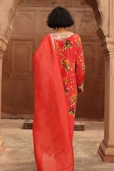 Red long kurta with sindori floral pine prints, elevated with rose gold embroidery. Paired with a pant and dupatta - Aza Fashions Huma Qureshi, Genelia D'souza, Sanya Malhotra, Karisma Kapoor, Anamika Khanna, Anushree Reddy, Diana Penty, Disha Patani, Rohit Bal