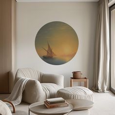 a living room filled with furniture and a painting on the wall