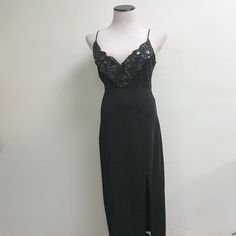 Stunning Vintage Tadashi Black Gown. Size Large. Spaghetti Straps..Rayon Nylon Blend. V Neck With Black Sequin Accents..Stretchy Back Zip... Side Slits..So Sexy! Condition: Excellent..Perfect For Party Season! Bust 16 Across At Underarm(32 Total..Unstretched..It Can Stretch Several Inches If You Need It) Waist 28 Hips 38 Length 54 From Top Of Bust To Hem Black Spaghetti Strap Evening Gown, Black Evening Gown With Spaghetti Straps, Black Spaghetti Strap Gown For Party, Black Spaghetti Strap Formal Gown, Black Formal Gown With Spaghetti Straps, Black Gown With Spaghetti Straps For Formal Occasion, Fitted Floor-length Slip Dress For Dinner, Chic Evening Gown With Spaghetti Straps, Elegant Gown With Spaghetti Straps For Night Out