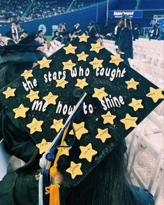 a graduation cap that says the stars who taught my how to shine is on someone's head